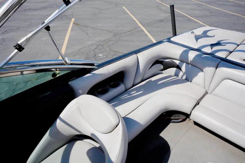 Slide: The Image of Interior of a 2007 Calabria PVO-V2 boat with white leather seating. - 10