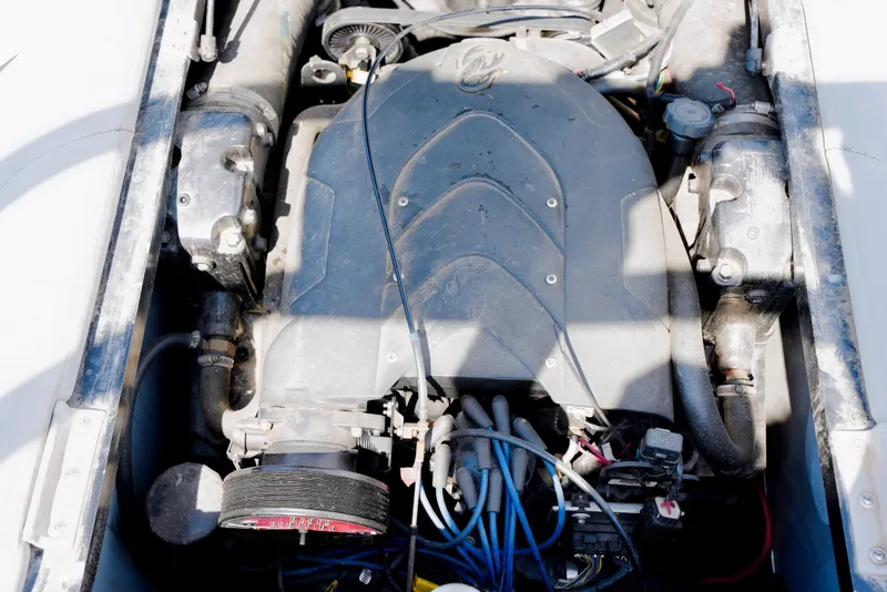 Slide: The Image of 2007 Calabria PVO-V2 engine compartment with visible components and wiring. - 14