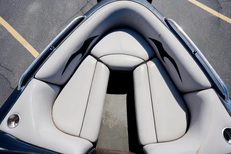 Slide: The Image of Bow seating area of a 2007 Calabria PVO-V2 boat with white upholstery. - 16
