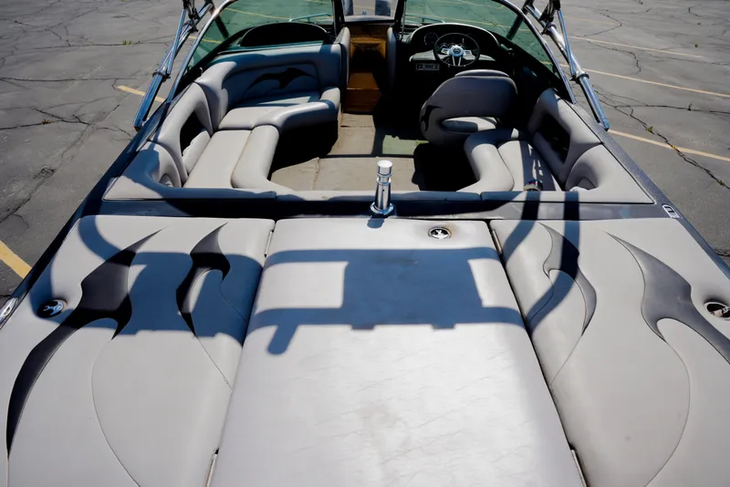 Slide: The Image of 2007 Calabria PVO-V2 boat interior with gray seating and steering wheel. - 17