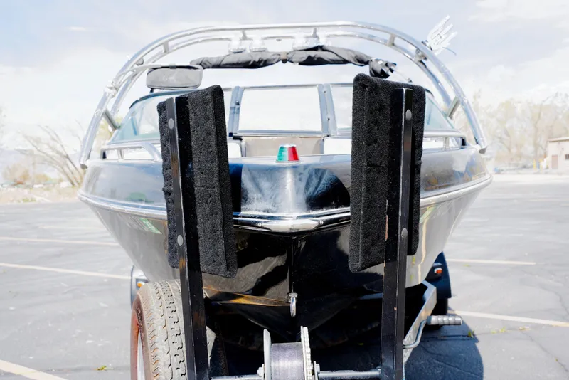 Slide: The Image of 2007 Calabria PVO-V2 boat on trailer, front view, parked outdoors. - 4