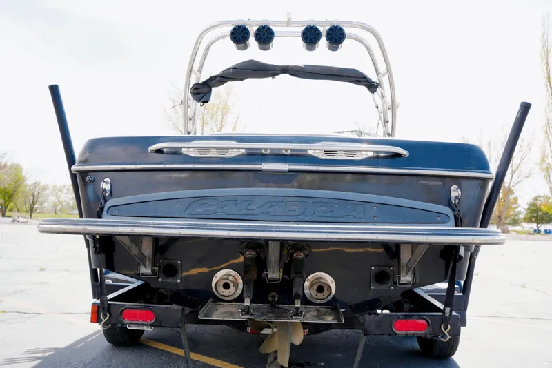 Slide: The Image of Rear view of a 2007 Calabria PVO-V2 boat, showcasing its sleek design and features. - 6