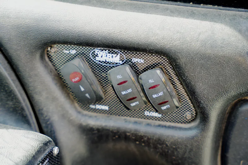 Slide: The Image of Control panel of a 2007 Calabria PVO-V2 boat with ballast system switches. - 8