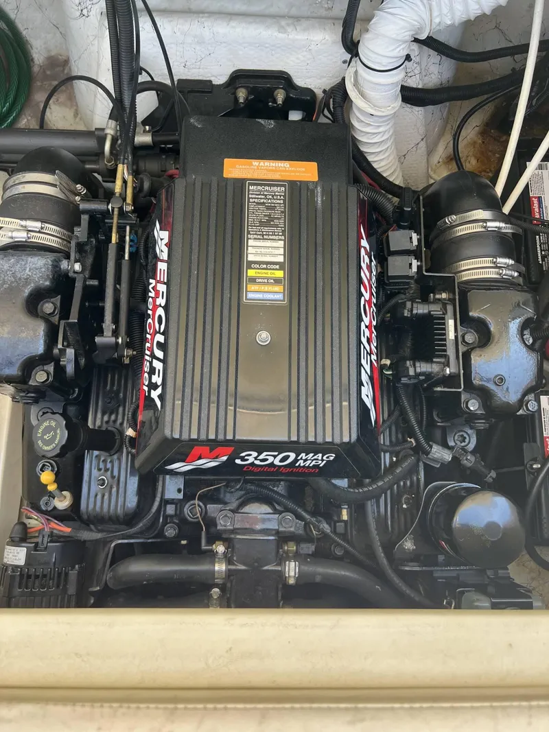Slide: The Image of 2001 Rinker Captiva 232 boat engine, MerCruiser 350 MAG MPI. - 7