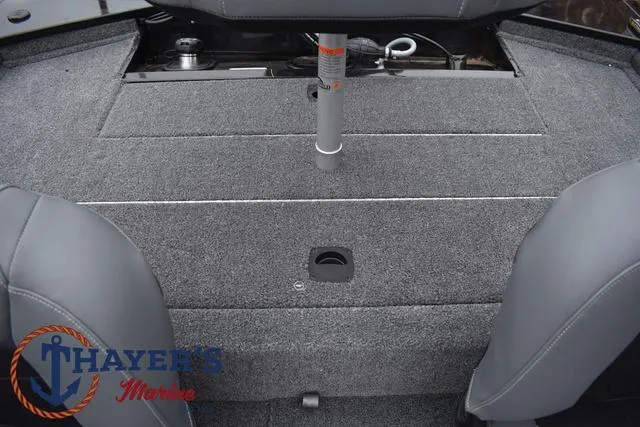 Slide: The Image of 2024 Tracker Pro 170 boat interior with gray carpet and seating. - 29