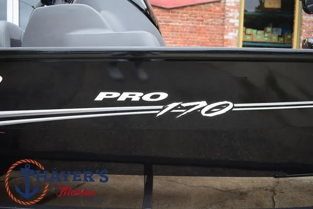 Slide: The Image of 2024 Tracker Pro 170 boat side view with logo. - 5
