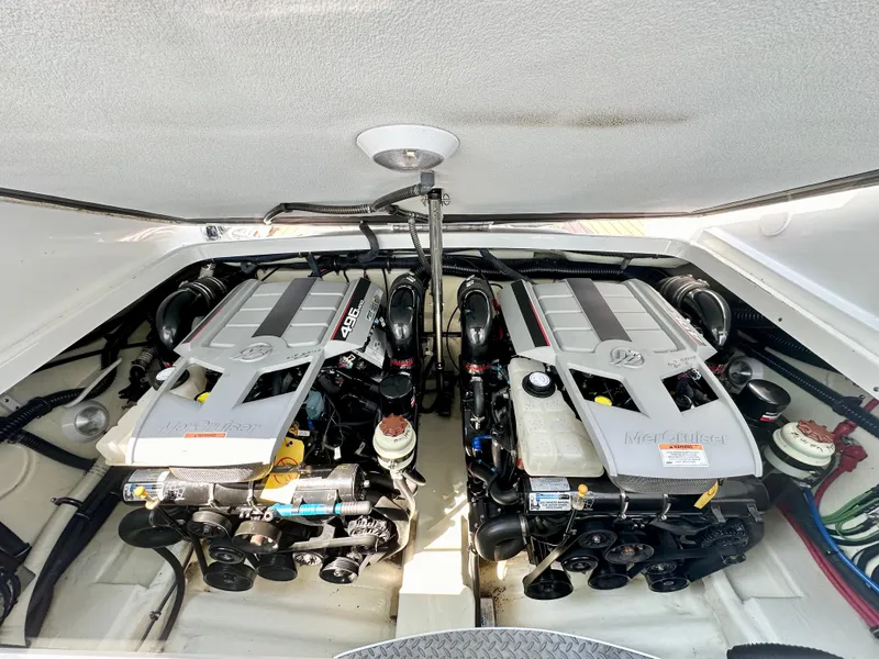 Slide: The Image of Twin engines in a 2008 Formula 310 Bowrider boat, showcasing powerful performance. - 20