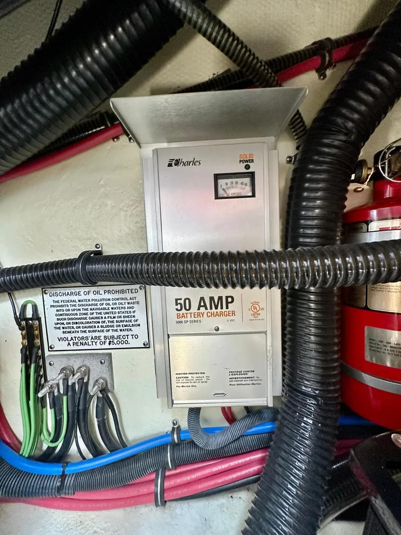 Slide: The Image of 50 AMP battery charger in 2008 Formula 310 Bowrider boat engine compartment. - 23