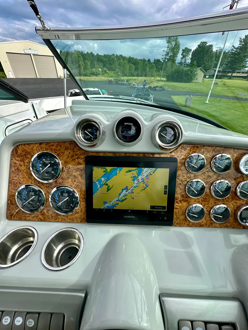 Slide: The Image of Dashboard of 2008 Formula 310 Bowrider with navigation system and gauges. - 8