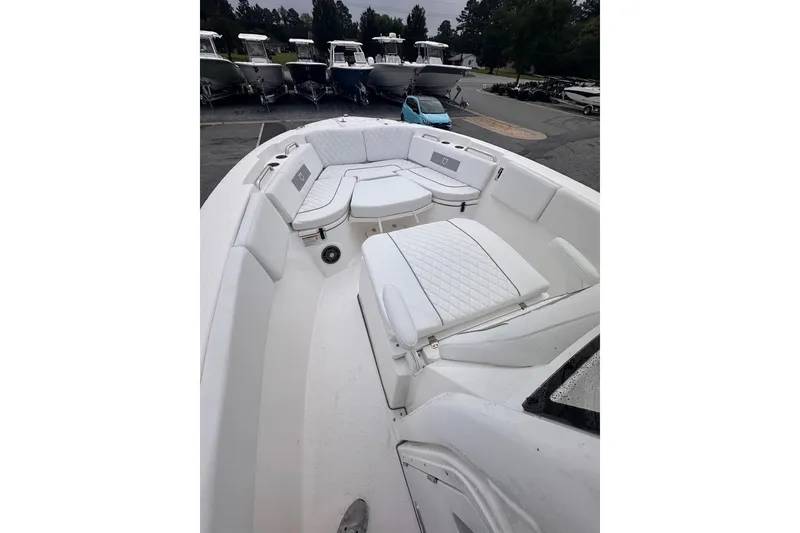 Slide: The Image of 2025 Sea Fox 268 Commander boat with spacious seating area. - 12