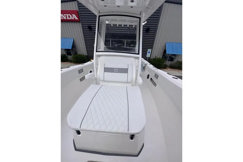 Slide: The Image of 2025 Sea Fox 268 Commander boat interior with cushioned seating. - 13