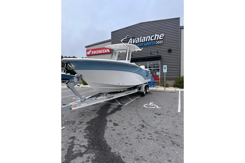Slide: The Image of 2025 Sea Fox 268 Commander boat on trailer at Avalanche Motorsports dealership. - 3