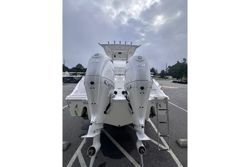 Slide: The Image of 2025 Sea Fox 268 Commander with twin 150 HP engines, rear view. - 6