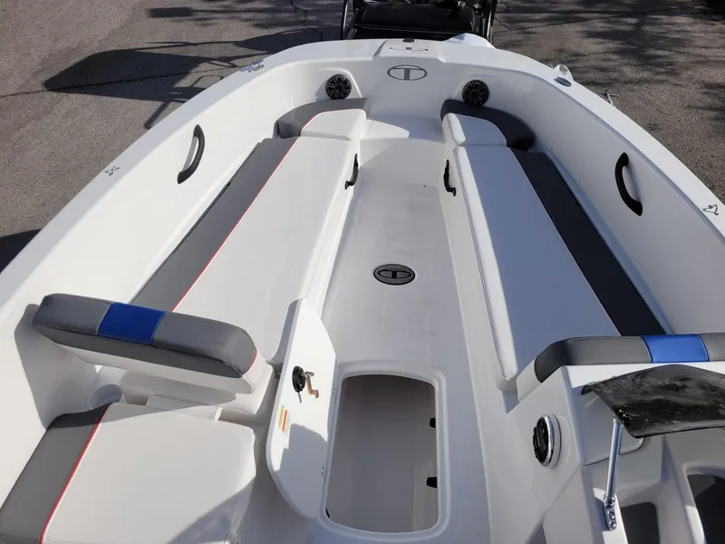 Slide: The Image of 2024 Tahoe T18 boat interior with seating and storage compartments. - 9
