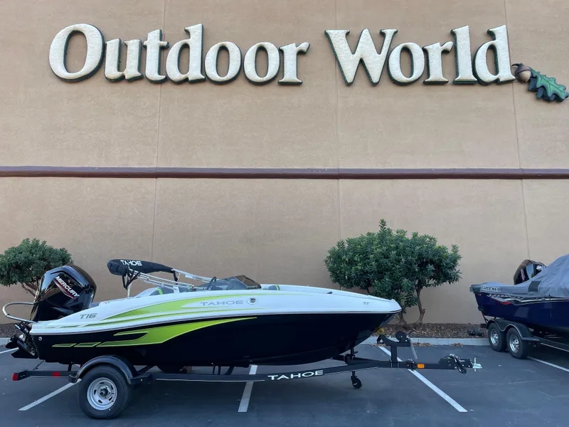 Slide: The Image of 2024 Tahoe T16 boat parked at Outdoor World store. - 2