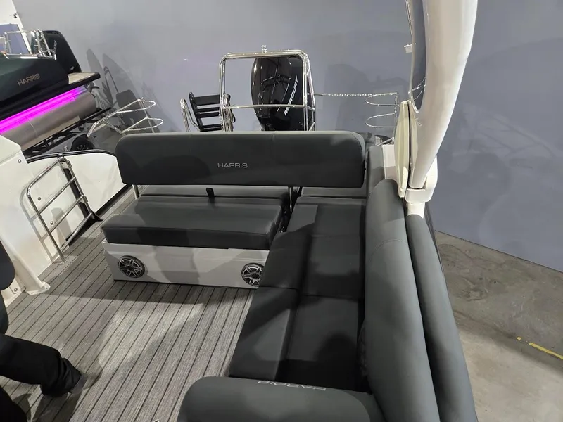 Slide: The Image of 2025 Harris Grand Mariner 250 boat interior with gray seating and modern design. - 5