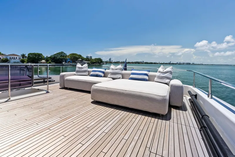Slide: The Image of Luxurious deck of 2022 Ferretti Yachts 850 with plush seating and ocean view. - 28