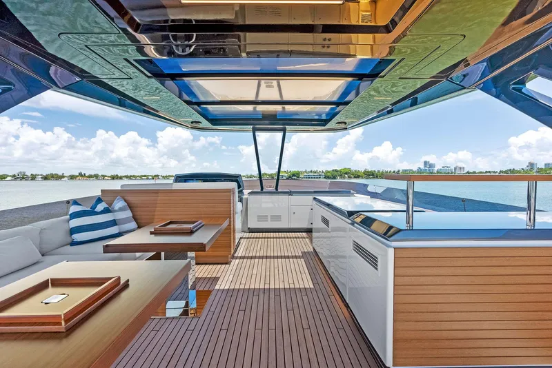 Slide: The Image of Luxurious 2022 Ferretti Yachts 850 interior with modern design and ocean view. - 32