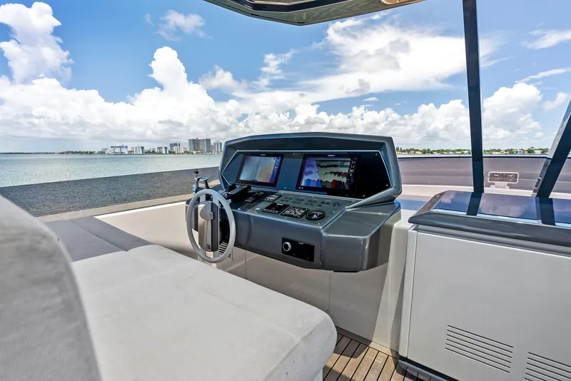 Slide: The Image of Ferretti Yachts 850 helm station, 2022 model, with ocean view and modern controls. - 34