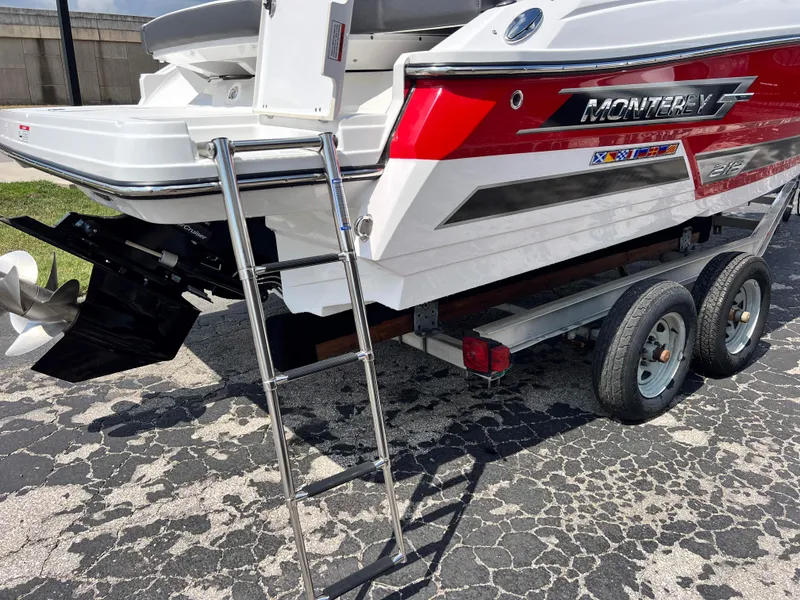 Slide: The Image of 2024 Monterey 218 SS boat on trailer with ladder and propeller visible. - 6