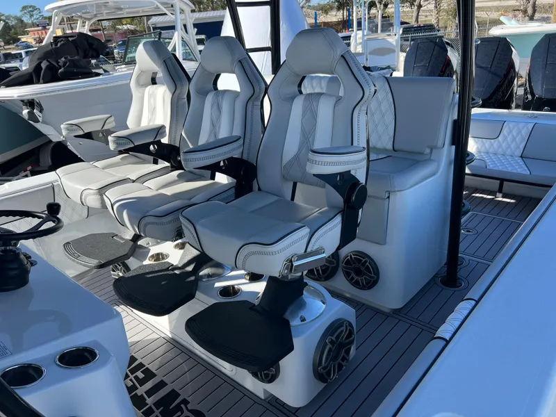 Slide: The Image of 2024 Contender 39 ST Center Console with luxurious seating and modern design. - 11