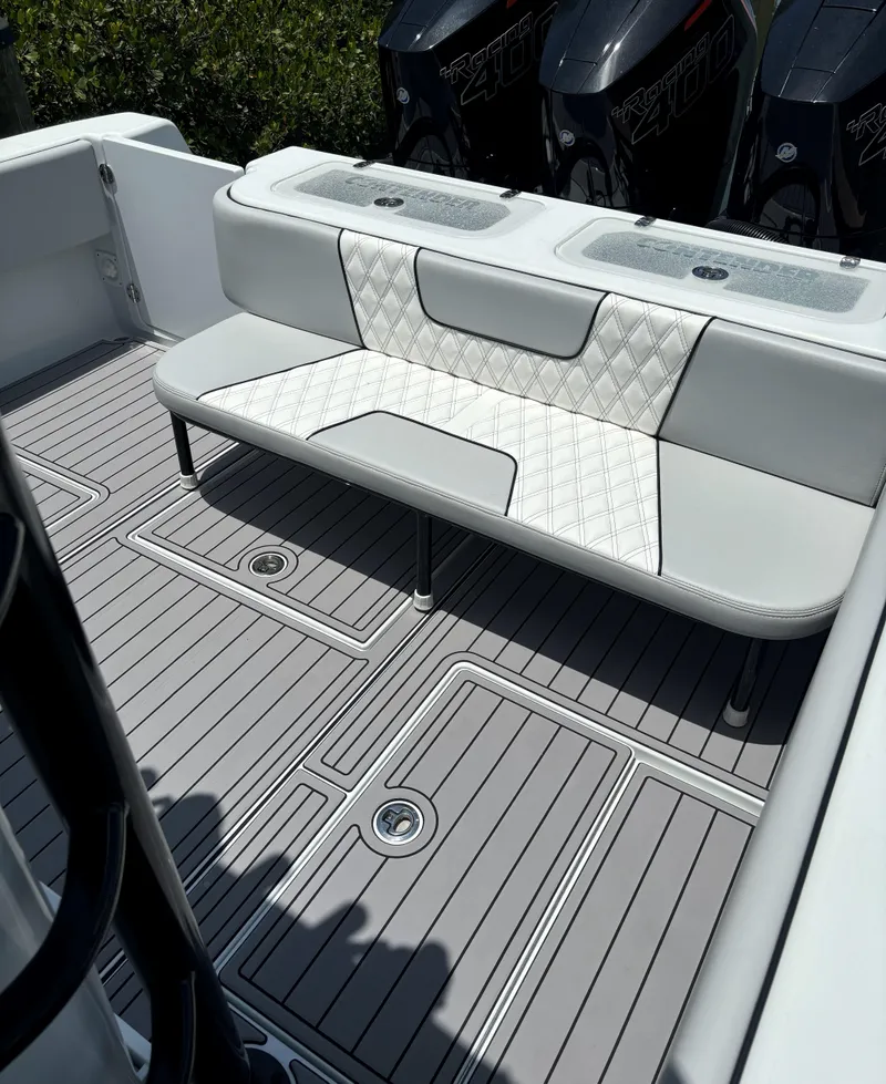 Slide: The Image of 2024 Contender 39 ST Center Console with stylish seating and sleek deck design. - 16