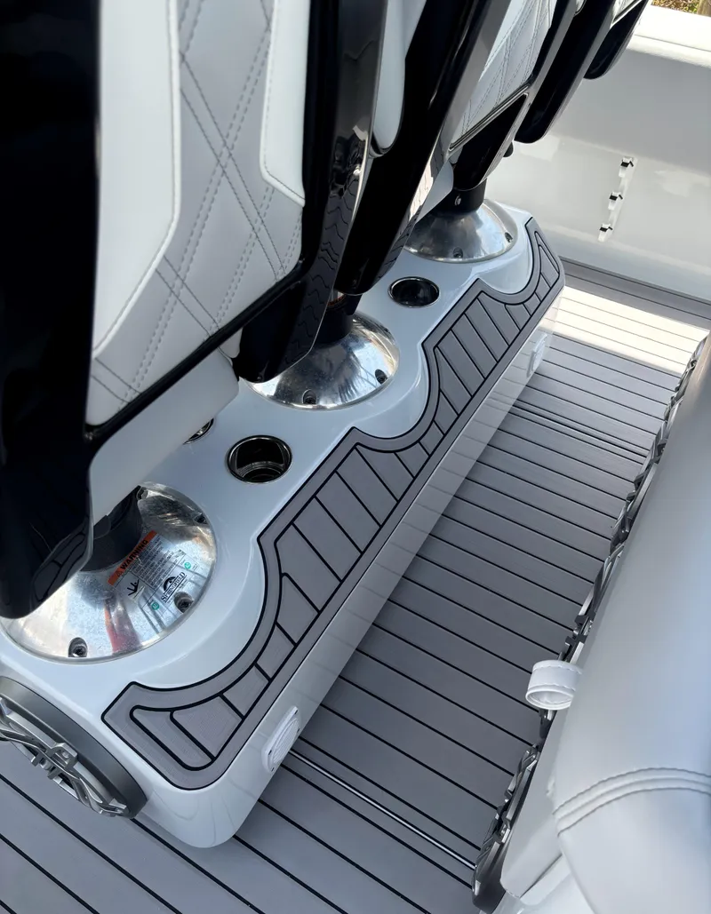 Slide: The Image of 2024 Contender 39 ST Center Console boat seating with sleek design and modern flooring. - 19