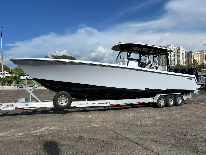 Slide: The Image of 2024 Contender 39 ST Center Console boat on a trailer. - 20