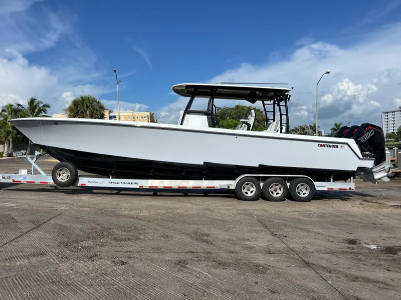 Slide: The Image of 2024 Contender 39 ST Center Console boat on a trailer. - 21