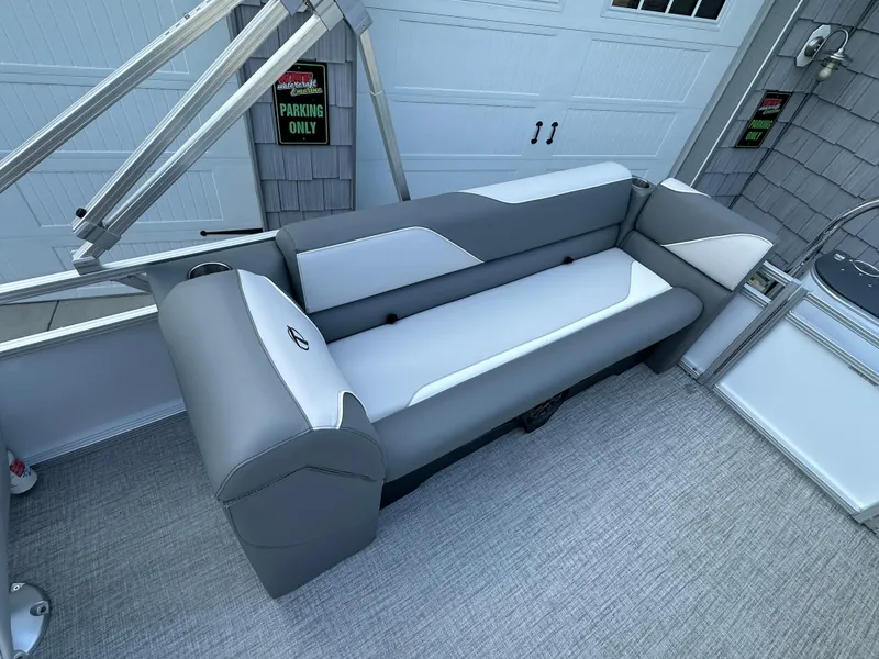 Slide: The Image of 2025 Tahoe Pontoon 2385 Sport 85 Quad Lounger Tri Toon seating area. - 18