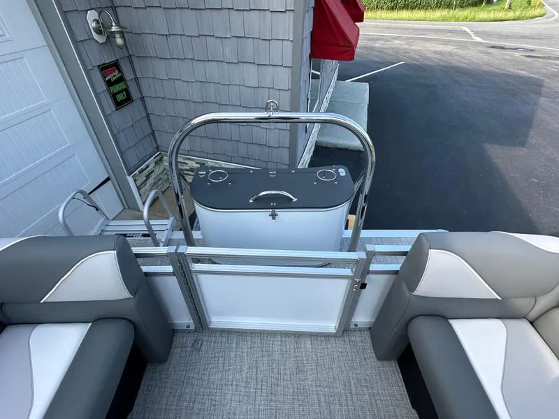Slide: The Image of 2025 Tahoe Pontoon 2385 Sport 85 Quad Lounger Tri Toon interior, rear seating and gate. - 19