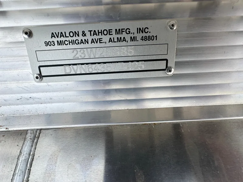 Slide: The Image of 2025 Tahoe Pontoon 2385 Sport 85 Quad Lounger Tri Toon manufacturer plate - 23