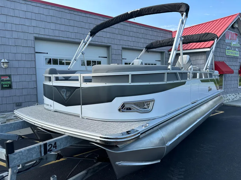 Slide: The Image of 2025 Tahoe Pontoon 2385 Sport 85 Quad Lounger Tri Toon on trailer. - 3