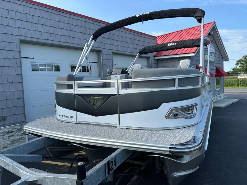 Slide: The Image of 2025 Tahoe Pontoon 2385 Sport 85 Quad Lounger Tri Toon on trailer. - 4
