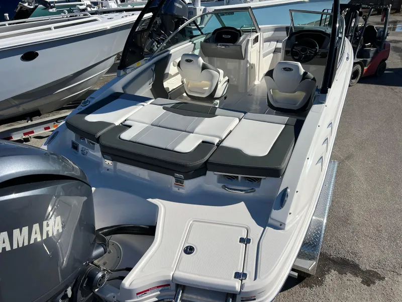 Slide: The Image of 2024 Chaparral 21 SSi OB boat with Yamaha outboard motor, featuring spacious seating. - 7