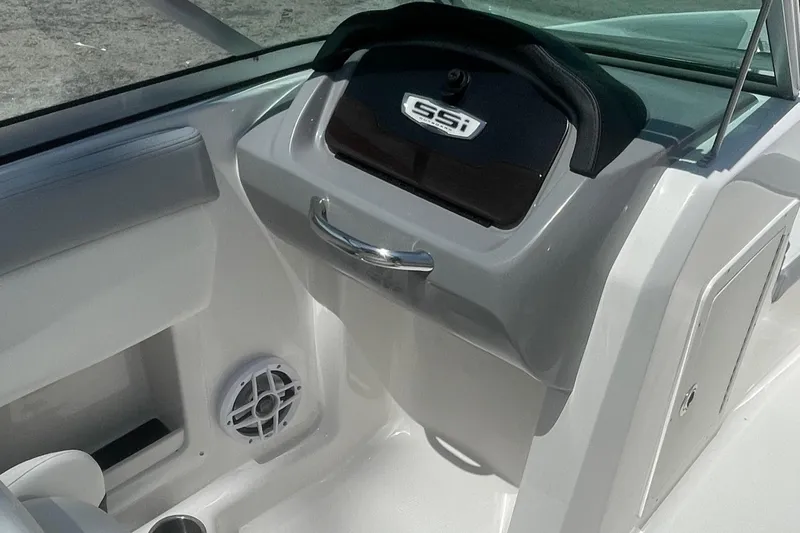 Slide: The Image of 2024 Chaparral 19 SSi OB boat interior, featuring sleek design and modern amenities. - 10