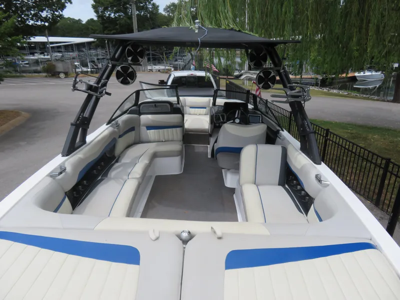 Slide: The Image of 2015 Malibu Wakesetter 24 MXZ boat interior with spacious seating and modern design. - 6