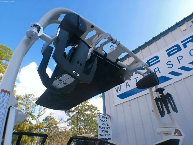 Slide: The Image of 2023 Nautique Super Air GS20 wakeboard tower at watersports facility. - 5