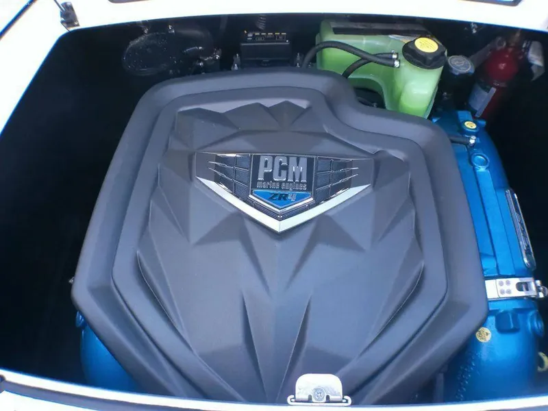 Slide: The Image of 2023 Nautique Super Air GS20 engine compartment with PCM engine cover. - 6