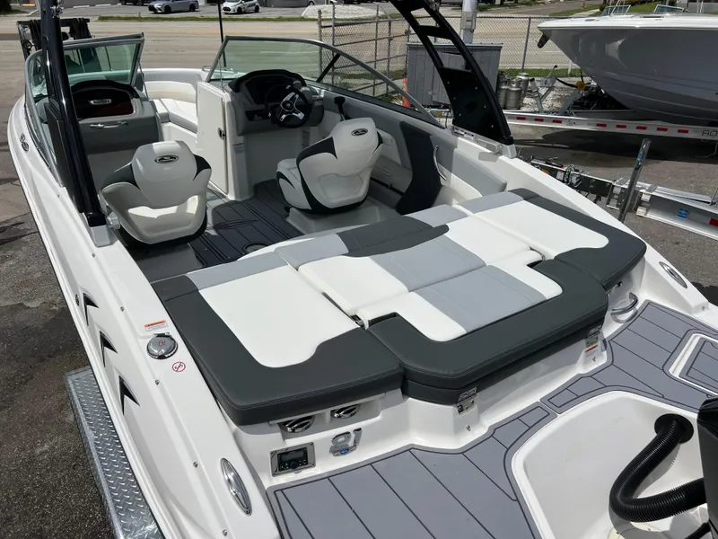 Slide: The Image of 2024 Chaparral 21 SSi OB boat interior with seating and helm. - 5