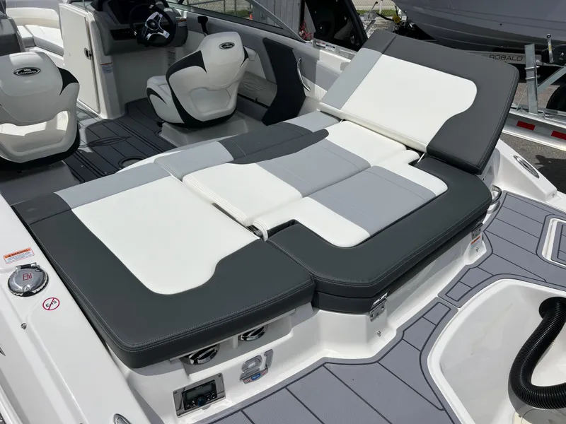 Slide: The Image of 2024 Chaparral 21 SSi OB boat interior with adjustable seating and modern design. - 6