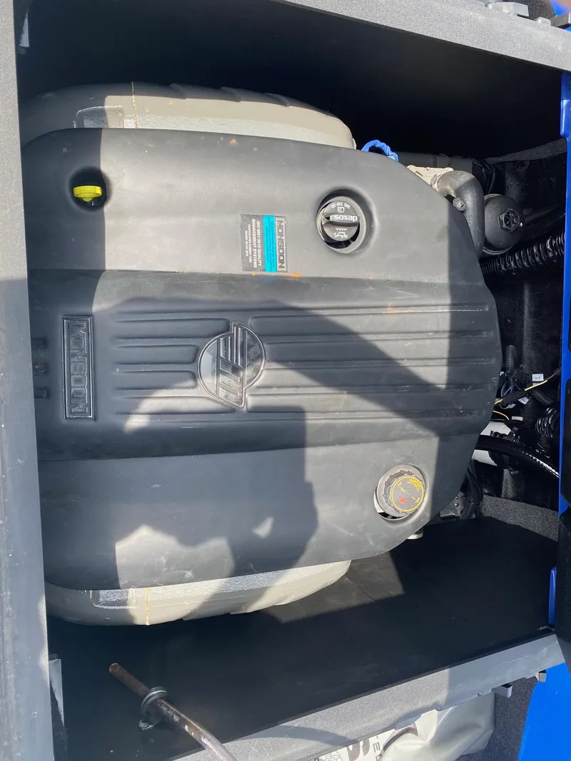 Slide: The Image of 2022 Axis T220 engine compartment with visible components. - 8