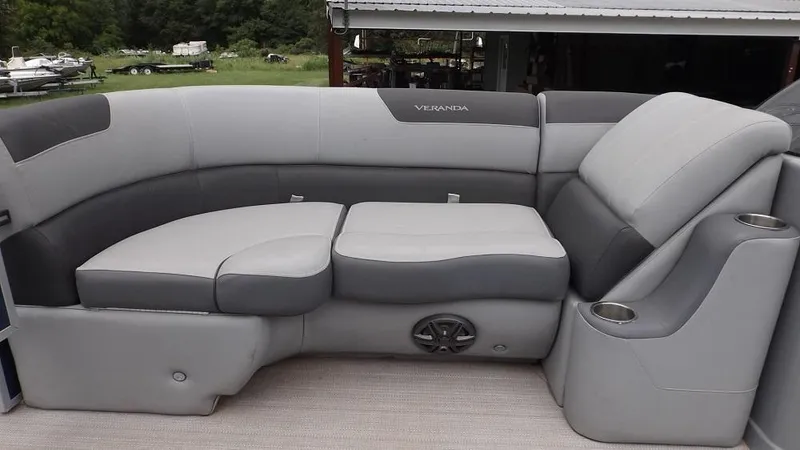 Slide: The Image of 2021 Veranda Fish VF22F2 boat interior with gray cushioned seating. - 13