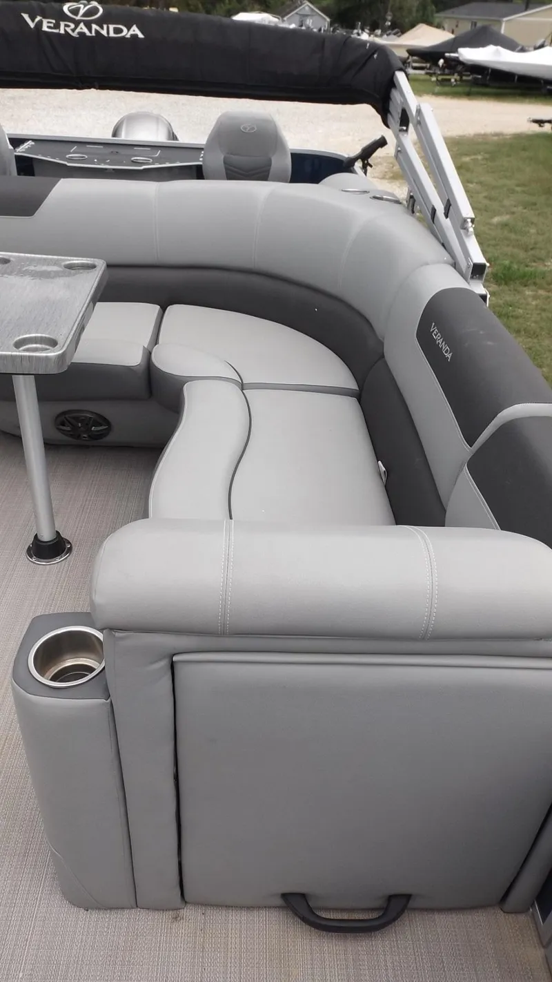 Slide: The Image of 2021 Veranda Fish VF22F2 pontoon boat with gray seating and cup holders. - 19