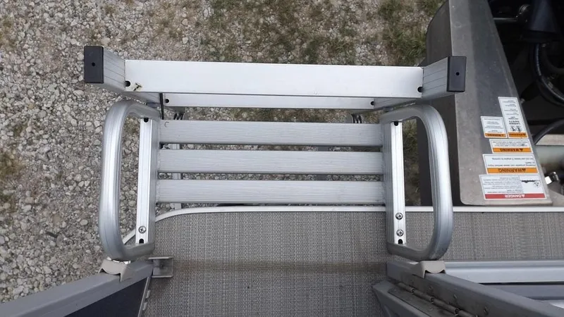 Slide: The Image of 2021 Veranda Fish VF22F2 boat ladder on gravel background. - 6