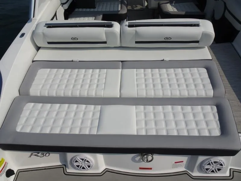 Slide: The Image of 2025 Cobalt R30 boat with luxurious white and gray seating. - 13