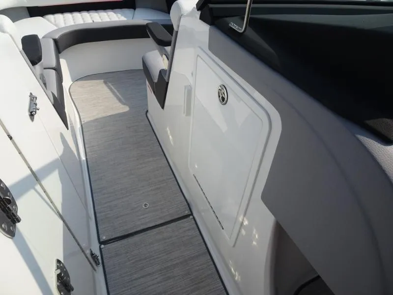 Slide: The Image of 2025 Cobalt R30 boat interior with sleek white and gray design. - 24
