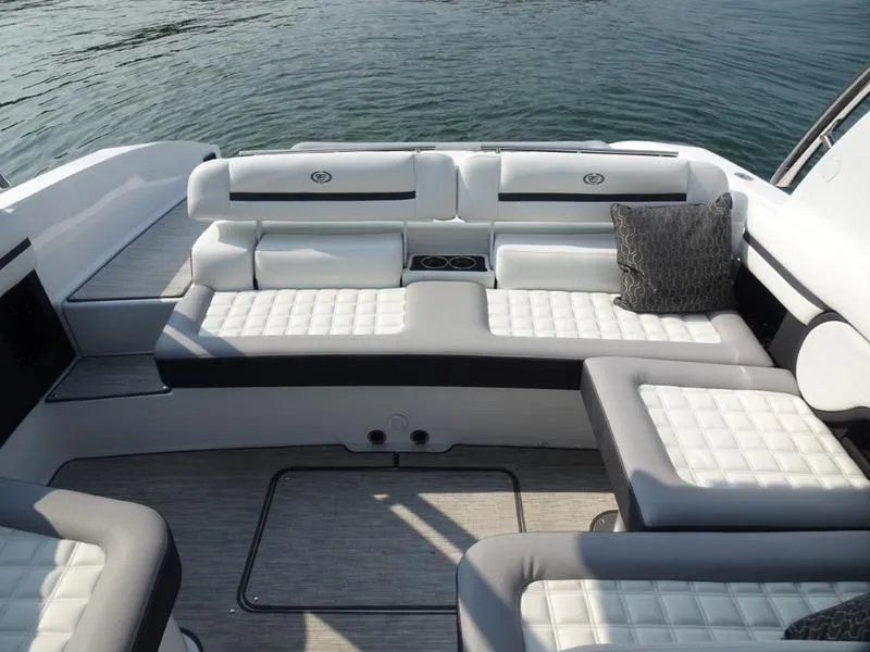Slide: The Image of 2025 Cobalt R30 boat interior with luxurious seating and water view. - 29