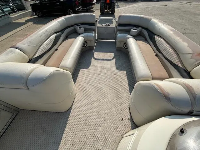 Slide: The Image of 2007 Bennington 2275RL pontoon boat interior with spacious seating and cup holders. - 11