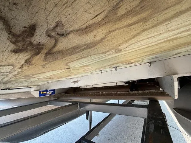 Slide: The Image of Underside view of a 2007 Bennington 2275RL boat on a trailer. - 2